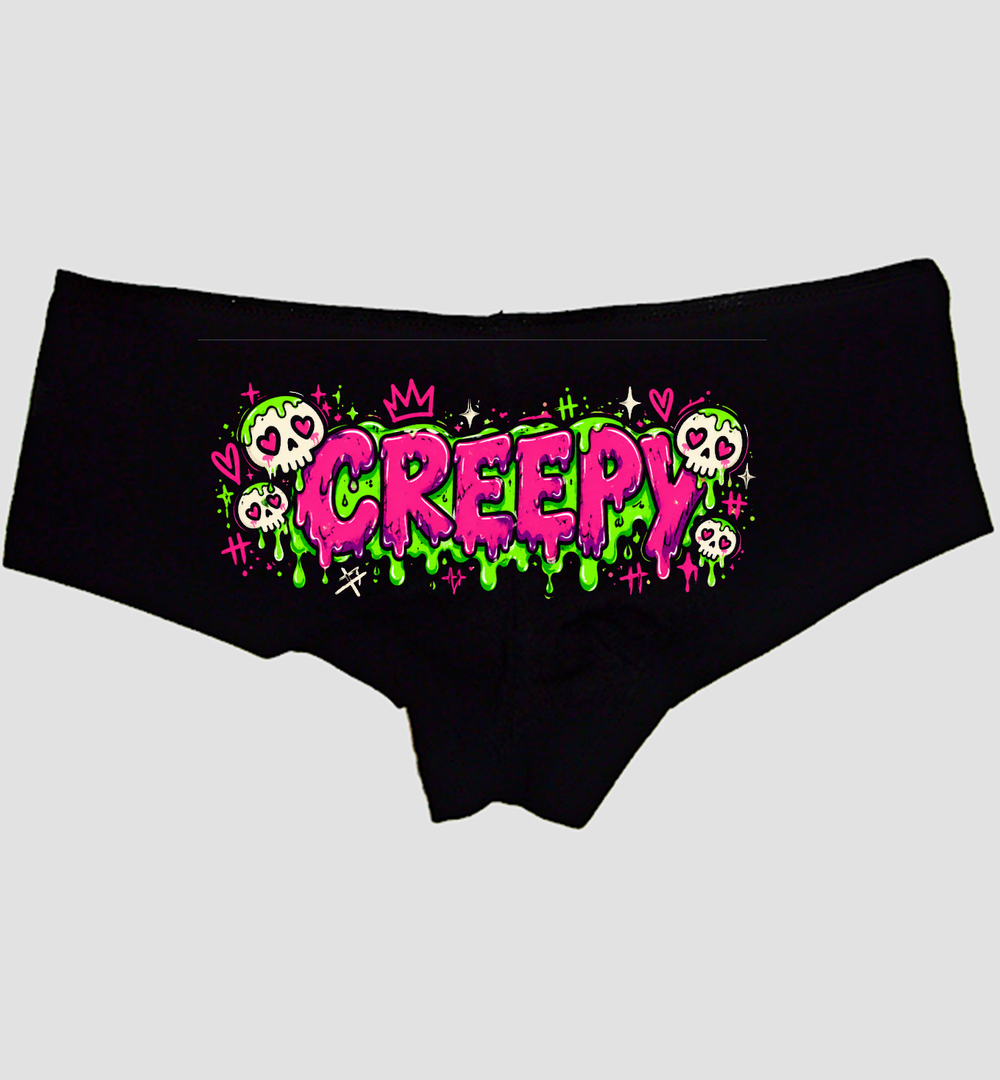 Black boyshort panties with hot-pink CREEPY lettering, green slime, and skulls — Sexy Girl Rock