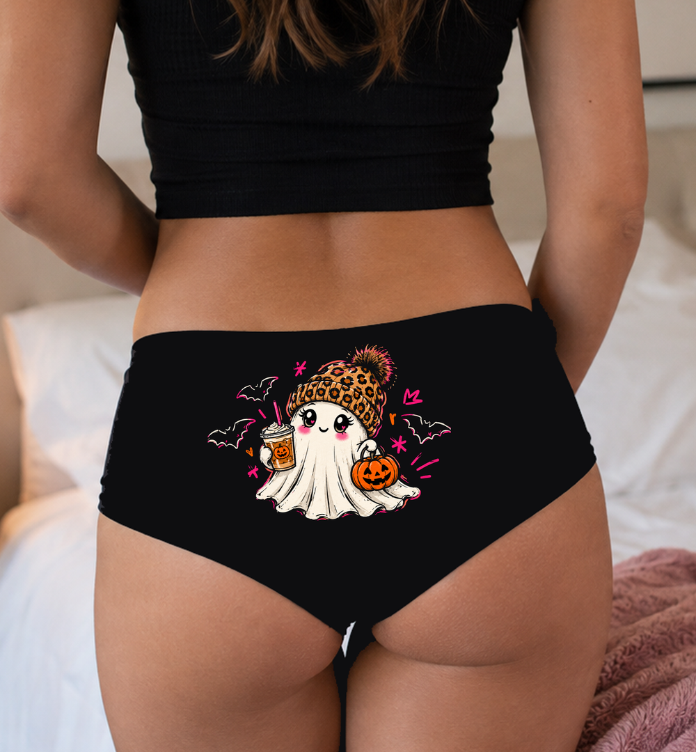 Model in a top wearing black boyshorts with the leopard beanie ghost print